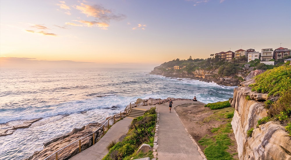 Early morning aerial shot of the people walking the Bondi to Coogee coastal walk